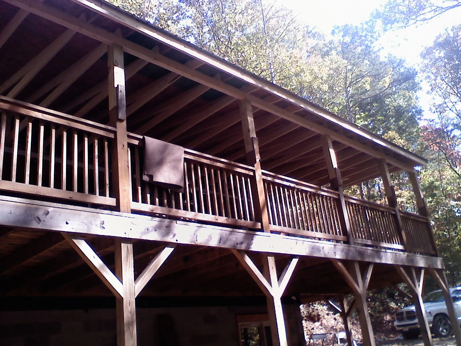 Timber framing under a new elevated porch and deck — Roof Leak Repair in Columbiana by Roofing Brothers
